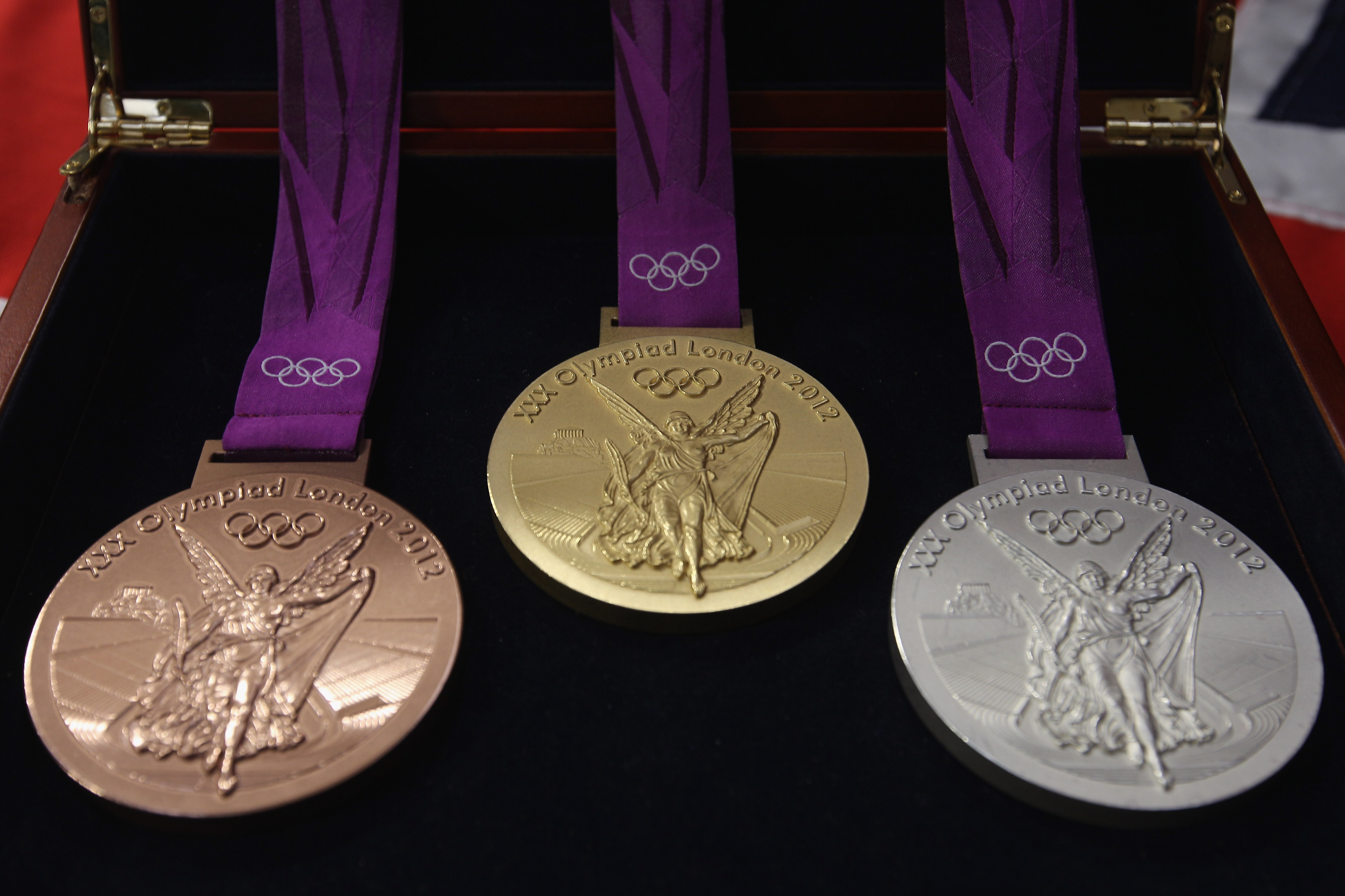 The most medals. Олимпийские игры Лондон 2012 медал. Золотая медаль Олимпийских игр Лондон 2012. Олимпийская Золотая медал. Медали олимпиады 2012 Лондон.